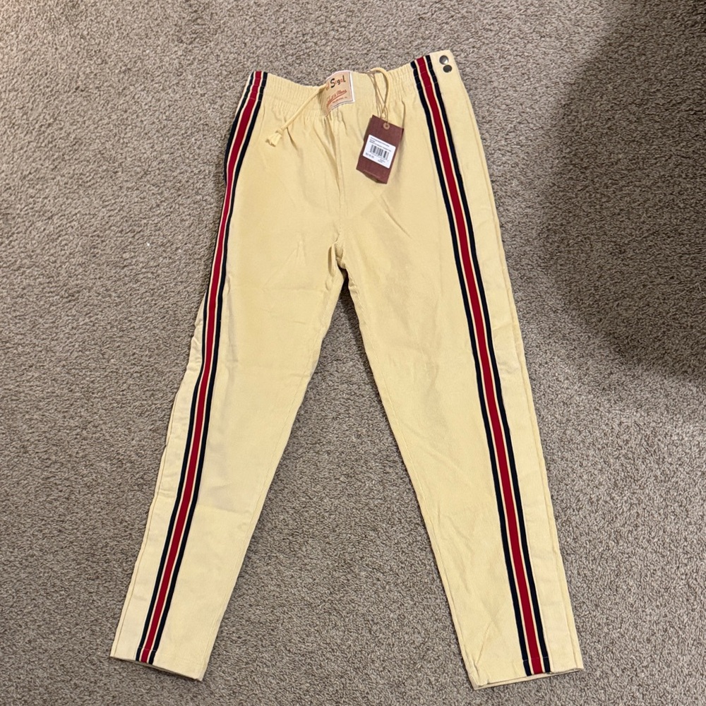 Yellow Pants with Red and Black Stripes